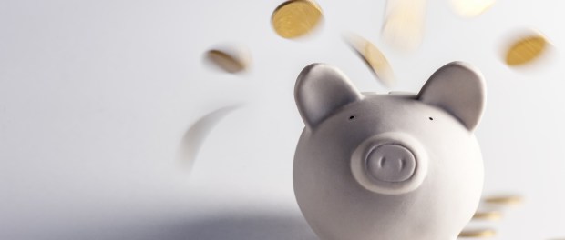 pig money box with golden coins