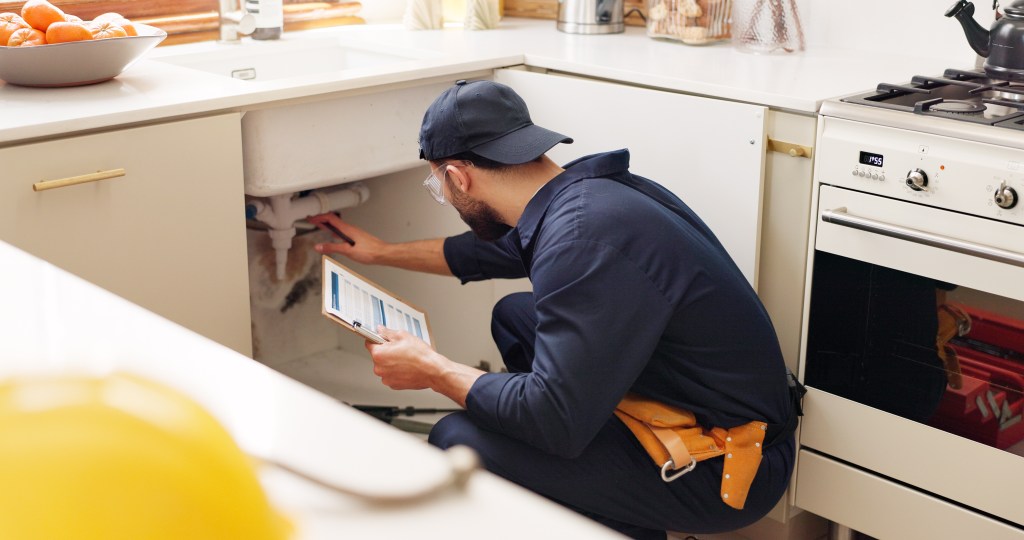 Plumber, house and handyman with clipboard, inspection and maintenance with expert. Employee, contractor and repair with checklist, service or quality control with industry, home renovation or skills.